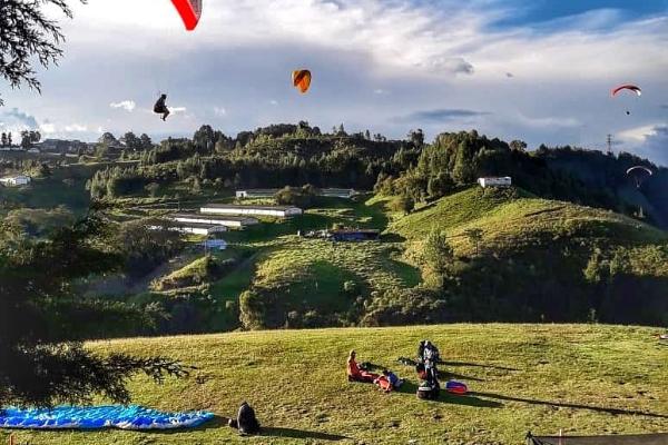 Where are some of the best locations to paraglide?